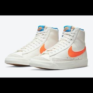 Orange and blue Nike Blazers Mid 77 High Tops Women’s size 7